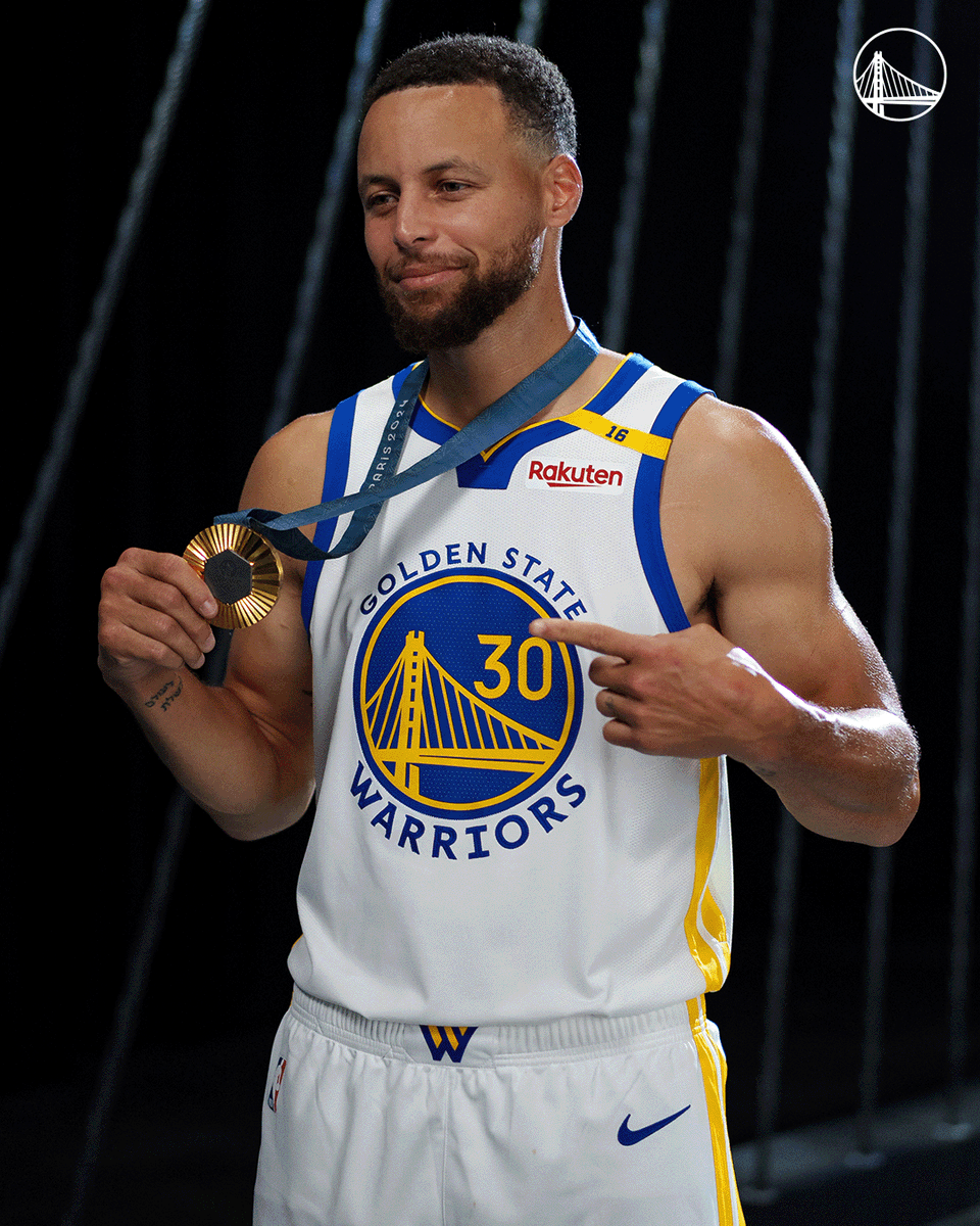 warriors's tweet photo. Showed up to #GSWMediaDay with some hardware 🏅 https://t.co/H4vZCPaNyY