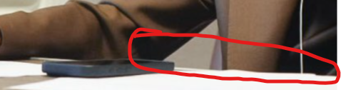 AirbotGamerTV's tweet photo. @realDonaldTrump The photo is blurred due to the camera focusing and censoring to protect the documents. The headphones are plugged in. These are not blank papers. I marked the indicators. The wire is visible but is muffled by being on the white surface with blur.

@CommunityNotes get on here. https://t.co/5VmrLfvidv