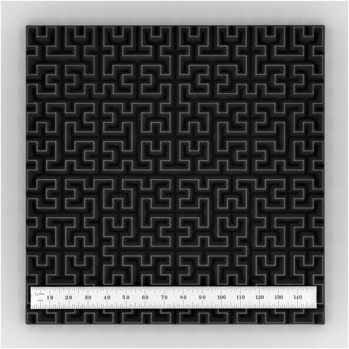 jwt0625's tweet photo. You've probably seen the array of pyramids in an anechoic chamber. You could make a "pyramid" of Hilbert curve so that it is 3D print friendly and still polarization insensitive. They used carbon-loaded HIPS and achieved lower than -20 dB reflectance over a wide frequency range. https://t.co/rGb0fHAagi