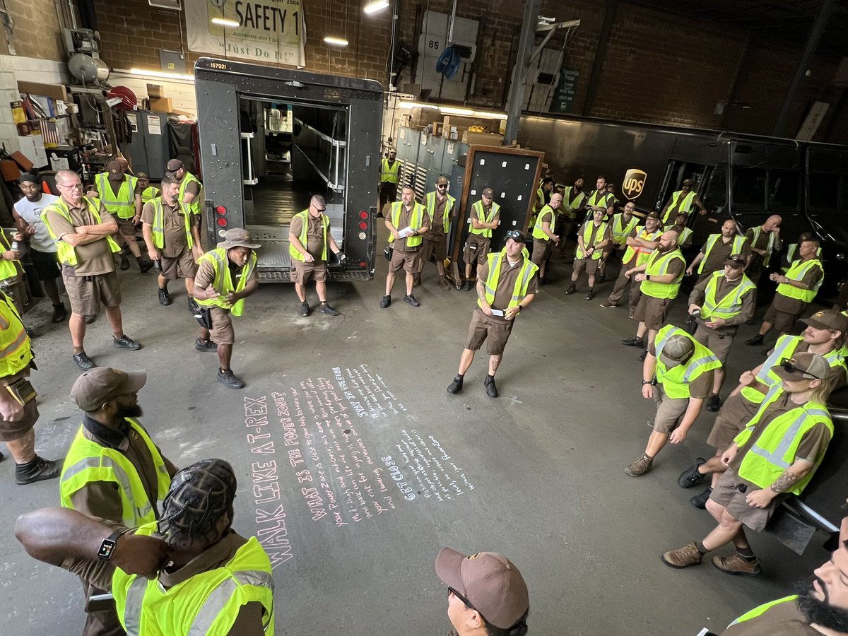 UPSManJohn's tweet photo. If it’s Tuesday, it’s time for our #GuardGateActivity and Calvin is talking about our power zone and being like a T-Rex. Your power zone runs from your mid thigh to your mid chest and works best when you keep what you are carrying close to you, like a T-Rex!! 🦖 https://t.co/oQJc1qP2OP