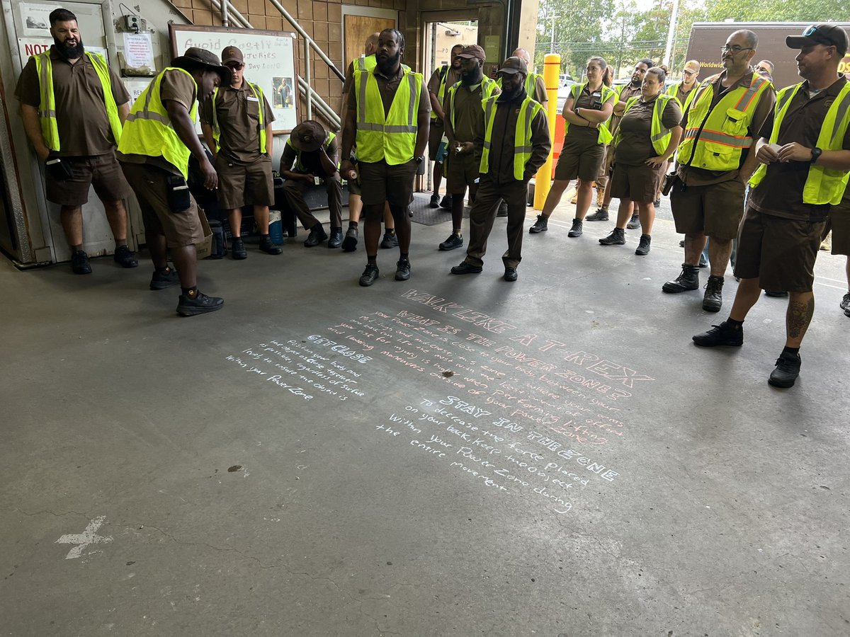UPSManJohn's tweet photo. If it’s Tuesday, it’s time for our #GuardGateActivity and Calvin is talking about our power zone and being like a T-Rex. Your power zone runs from your mid thigh to your mid chest and works best when you keep what you are carrying close to you, like a T-Rex!! 🦖 https://t.co/oQJc1qP2OP