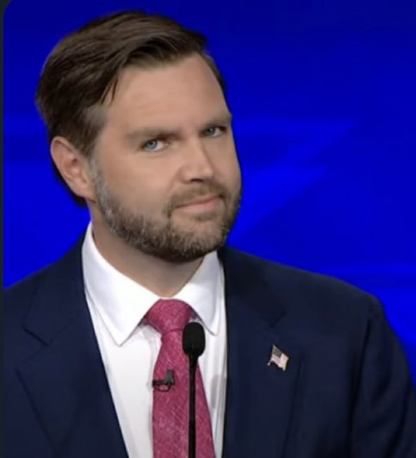 JD Vance looks at the camera like he’s on The Office