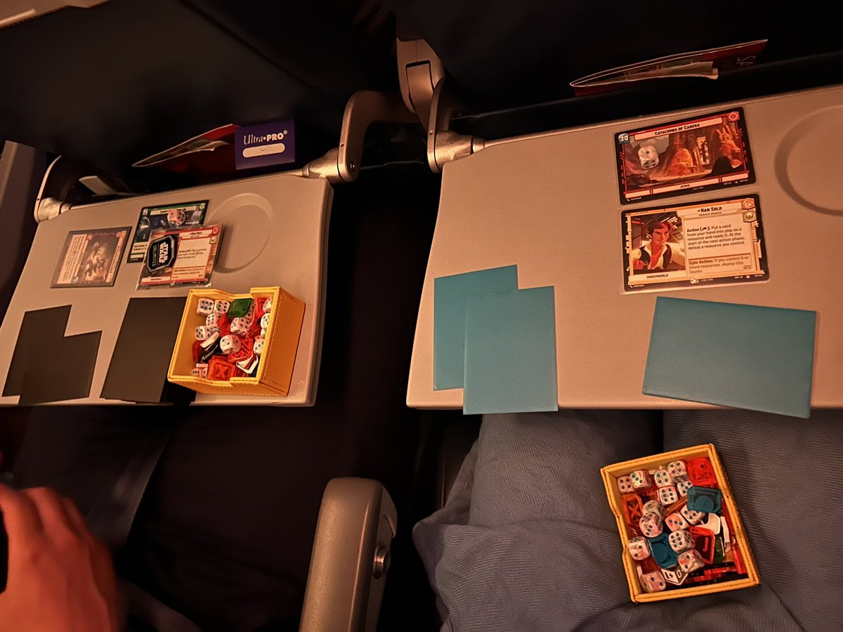 NavelFlorange's tweet photo. Unfortunately, no “Seatback Experience” on this Delta flight. Luckily, the premier decks were in the backpacks! 1-1 when drinks came around and we had to put it on pause https://t.co/xuqh7kGZ1k