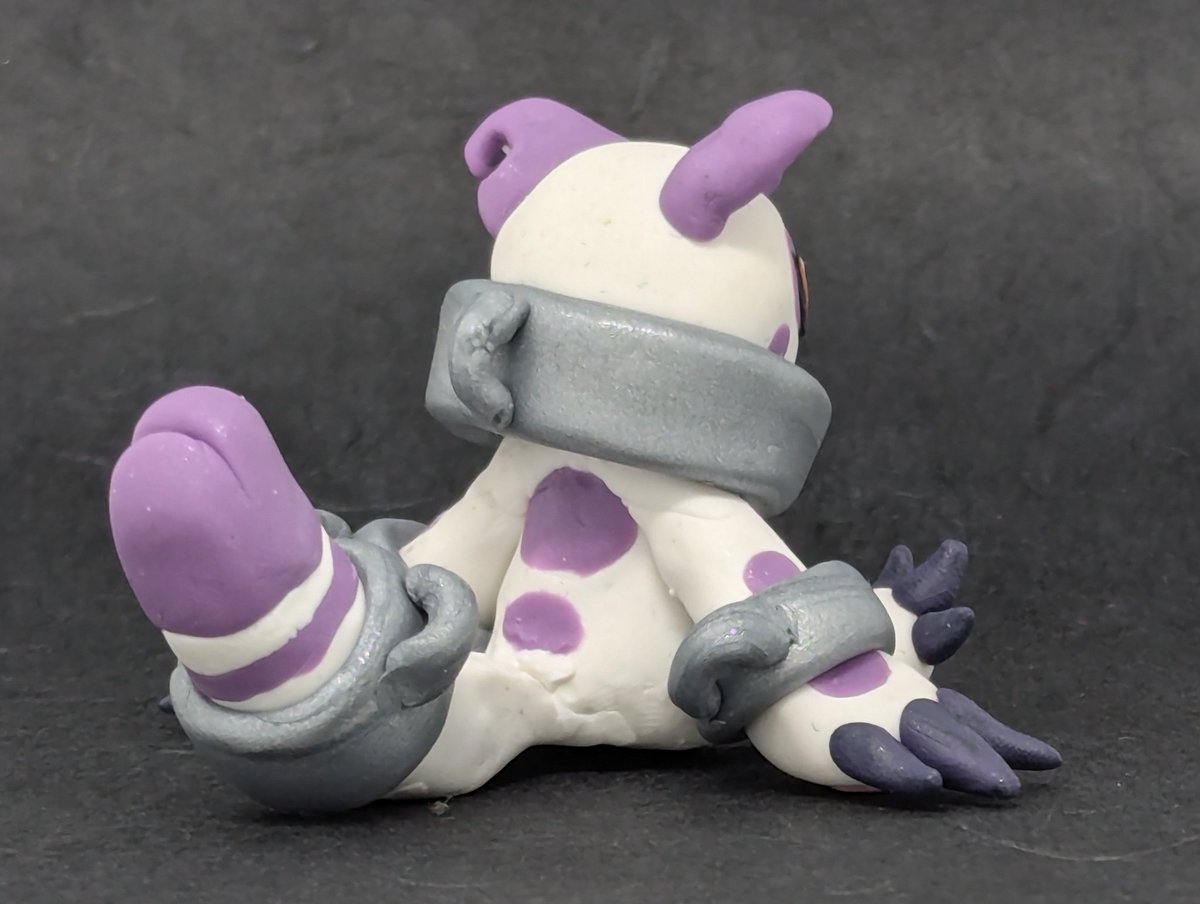 Catenamon but real??? Made the lil guy from polymer clay! Now he can sit on my desk and judge my every move :3 
#digimon #digifake