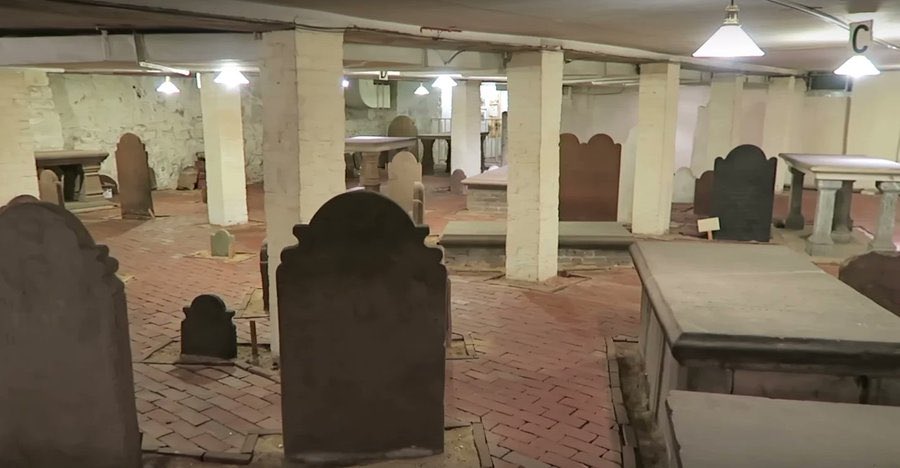 CreepyKnowledge's tweet image. An untouched 1800s cemetery preserved beneath the basement of a tall building constructed on top of it.