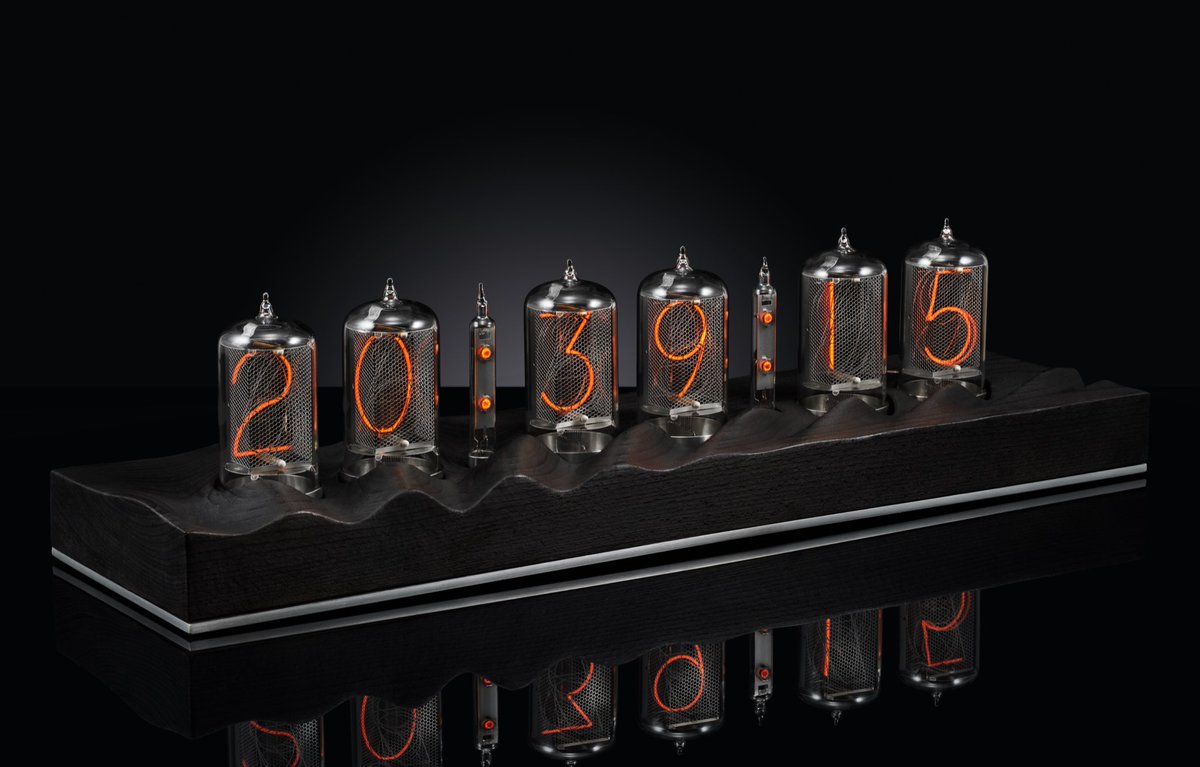 RC_Sterling's tweet photo. Nixie clock no. 3 is made from carve beech which is then burnt and waxed. #nixie #nixieclock https://t.co/mEqiGRTXnd