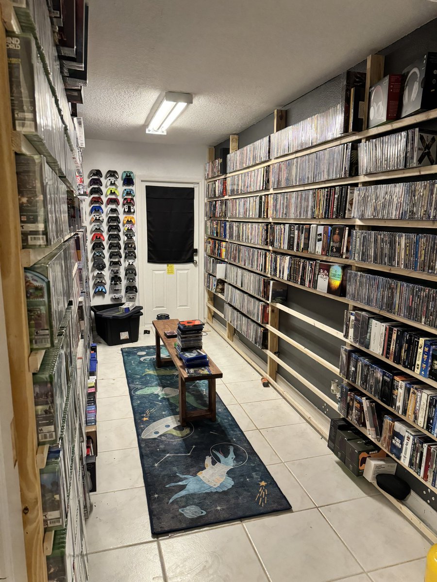 Alienatedgoose's tweet photo. @FunWithHorror Still building the space, but I am all in on physical movies and video games https://t.co/A7fOTXcvV1