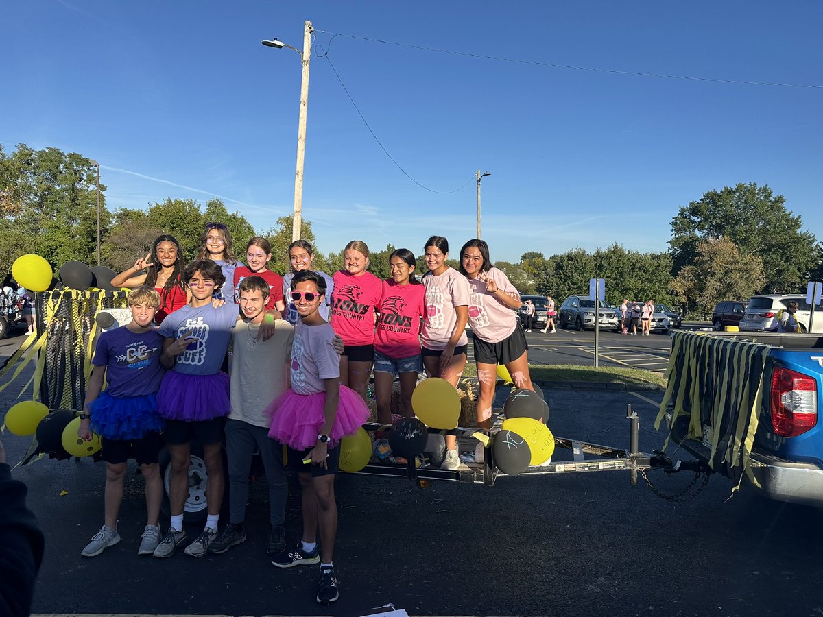 FXE XC -when we aren’t running on a cross country course, we’re having fun taking part in the Homecoming Parade. Have fun team!