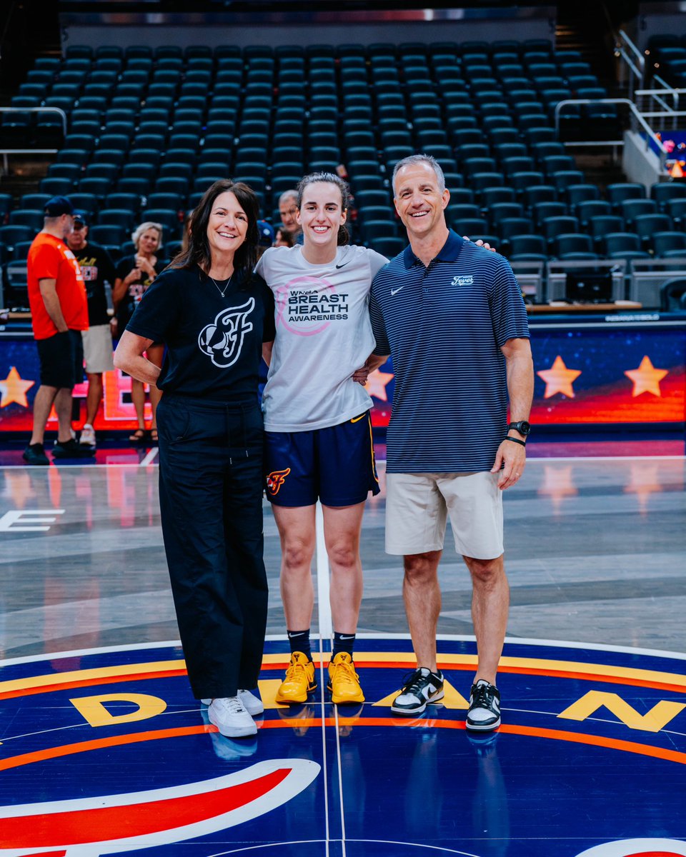 Caitlin and family on the Fever court after her last home game of her rookie season ❤️