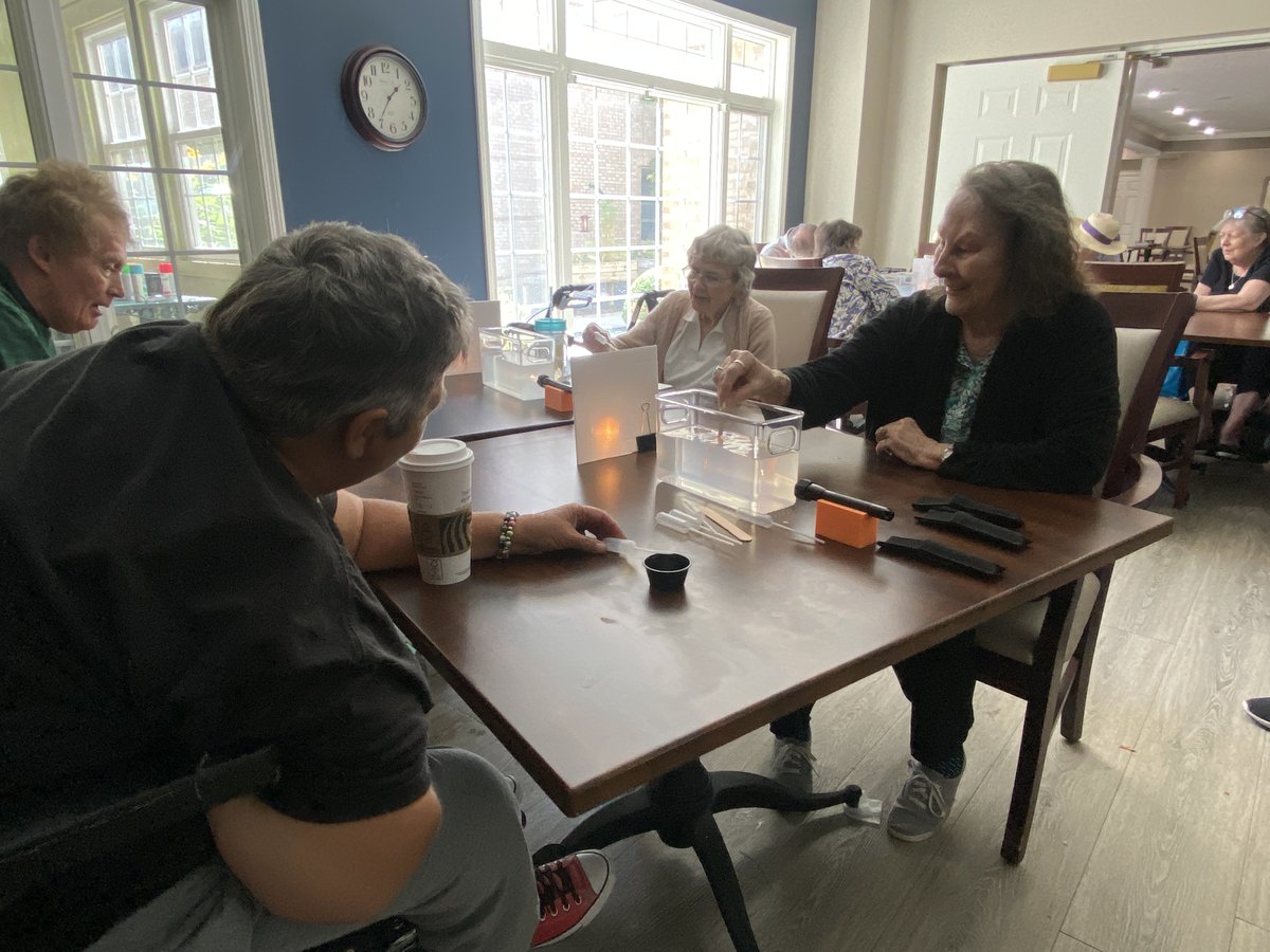 PhysAstroK12's tweet photo. @PurduePhysAstro and @PurdueAstroClub took West Lafayette Assisted Living by storm with our interactive presentation of #BlueSkies and #RedSunsets. Residents learned about scattering and transmission of wavelengths of light in Earth's atmosphere.  @PhysAstroK12 rocks. https://t.co/nfjmwdkkoA