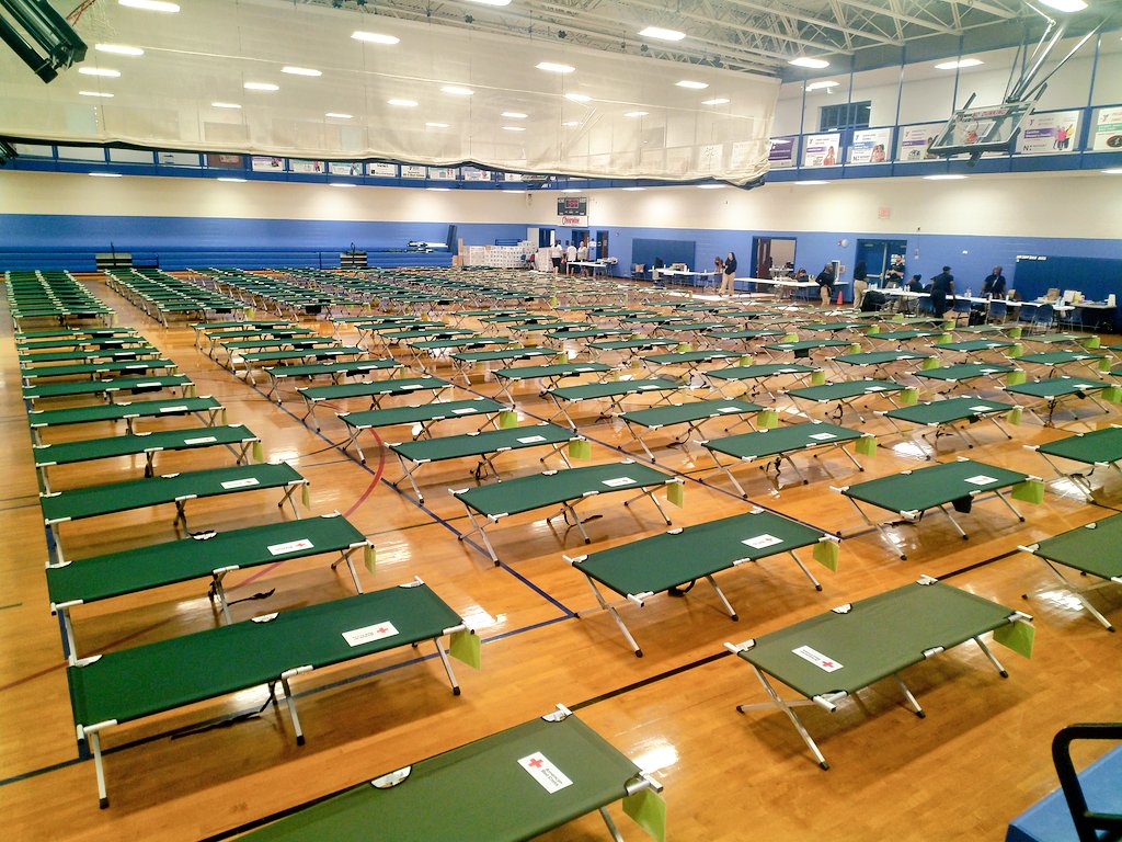 CFP387's tweet image. @RedCross_NC, in association with a number of managing partners, are standing by and ready to welcome up to 175 people tomorrow morning from western NC displaced by hurricane Helene. Today, a crew has been finishing the last preparations inside a gymnasium at the Salisbury YMCA.