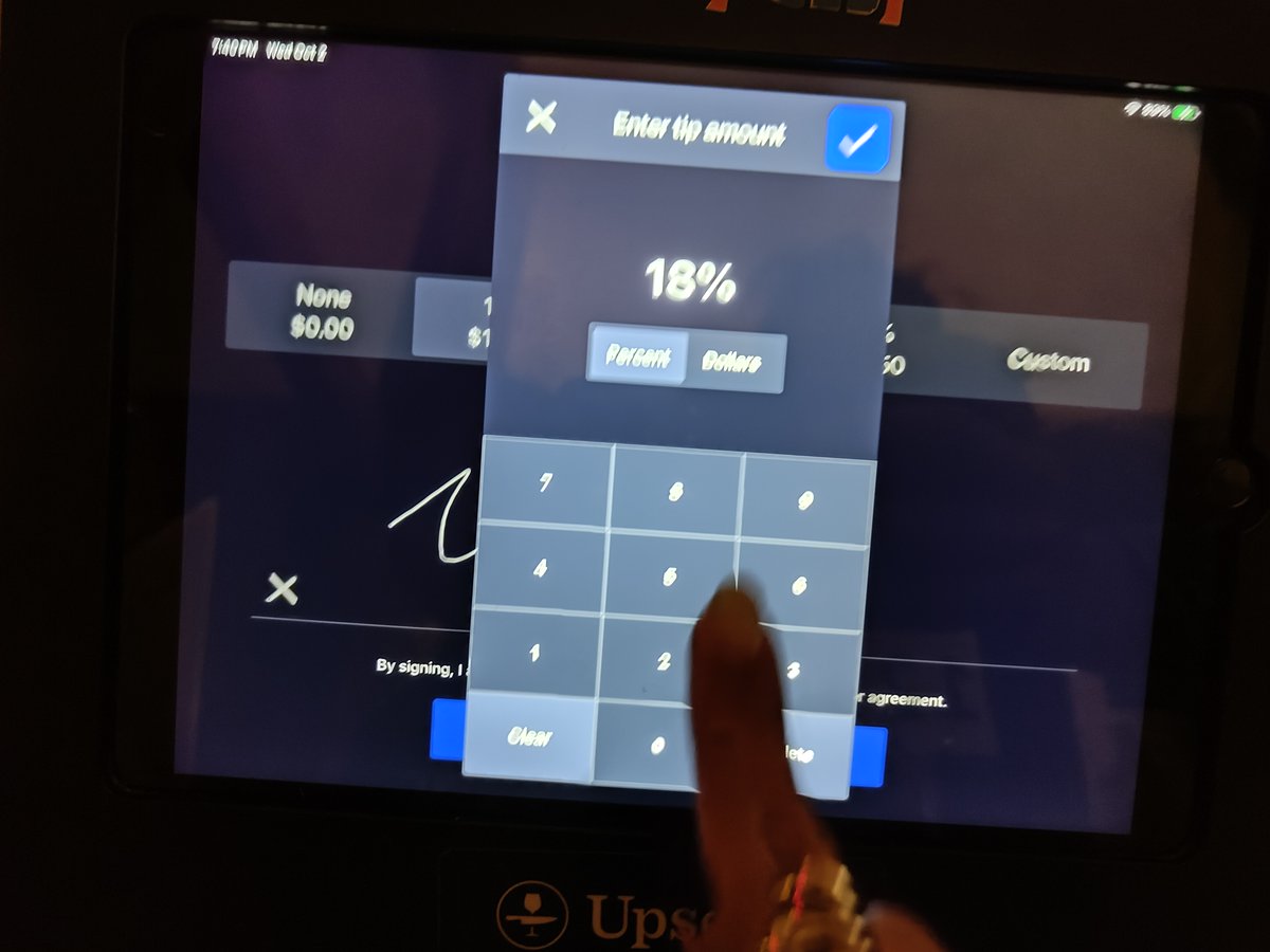 _colin_scott_'s tweet image. Remember when Square / Clover reversed the order of the tip amounts on restaurant tablets and we all thought it was evil?

Somehow the latest trick seems worse... look carefully at the number pad (apologies for the blurry photo)