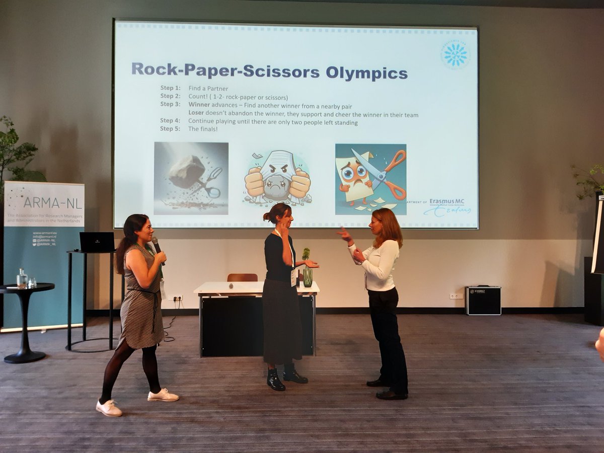 And the winner is... the super exciting final of the Rock-Paper-Scissors Olympics. #armanlconference