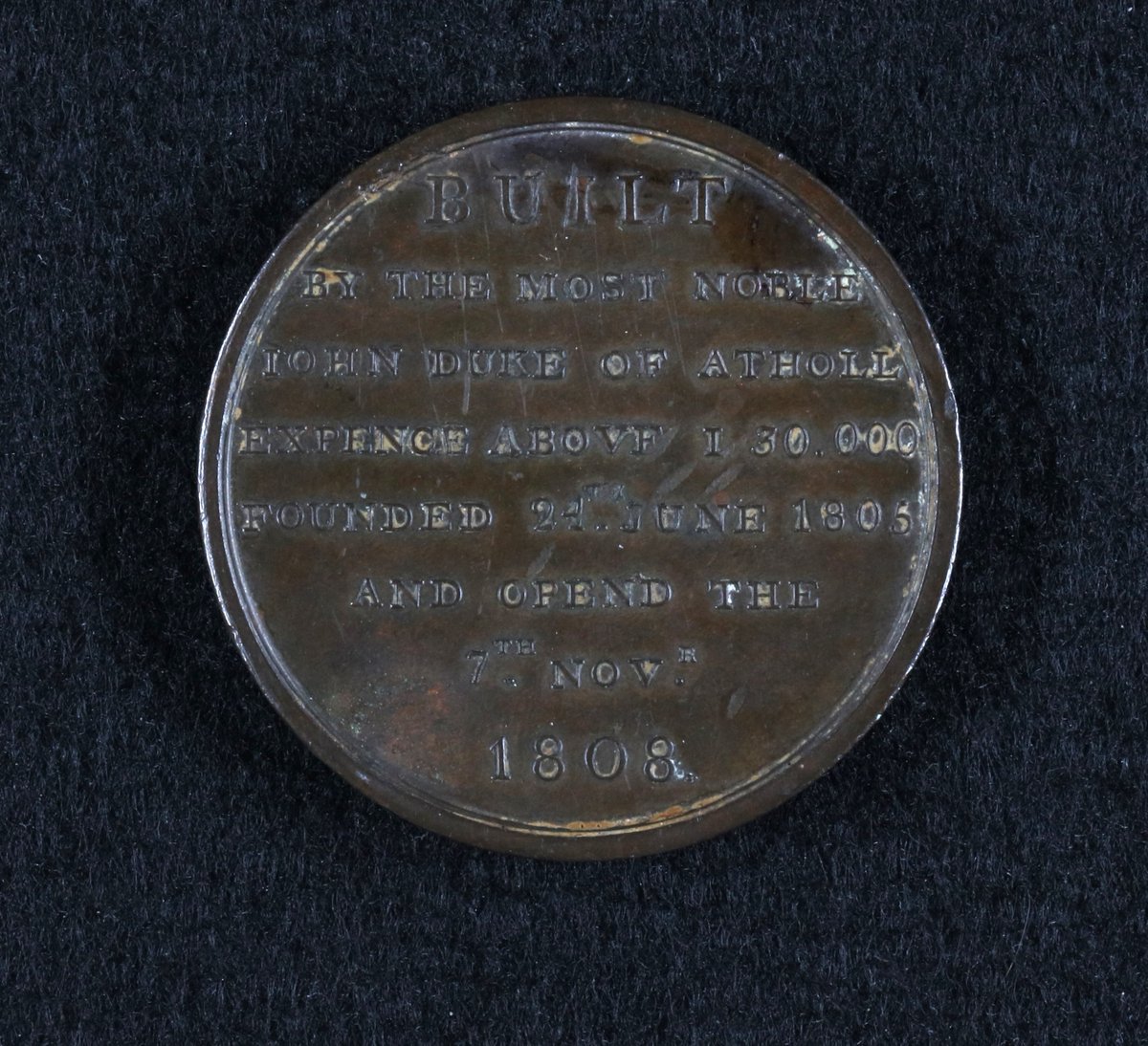 HistoricDunkeld's tweet image. Celebrate #ScottishMuseumsDay with our #tinytreasures! 

This is a bronze medal struck to commemorate the opening of Dunkeld's iconic Bridge on the 7th of November 1808. 

The bridge eventually led to the Dunkeld Bridge toll riots, click to learn - historicdunkeld.org.uk/dundonnachie-2/