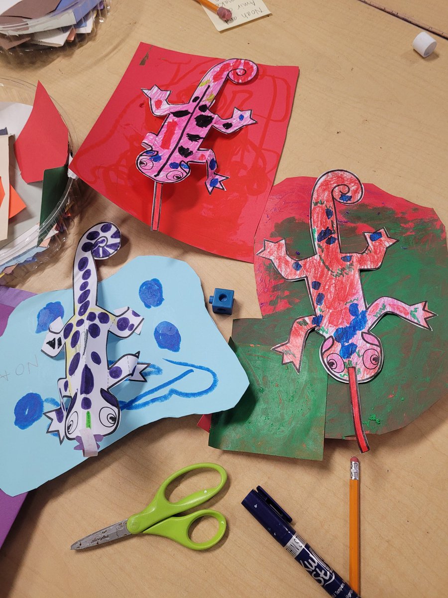Paper lizard sculptures made by Ms. Mays' class