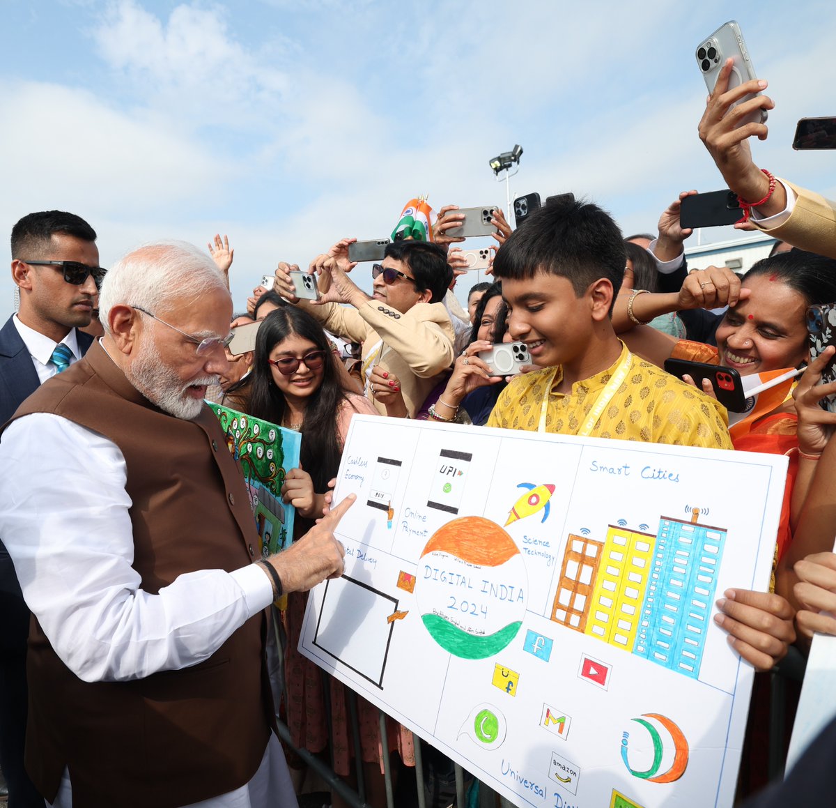 narendramodi's tweet photo. An energetic welcome in Philadelphia! Our diaspora’s blessings are greatly cherished. https://t.co/vwIc9dB2yv