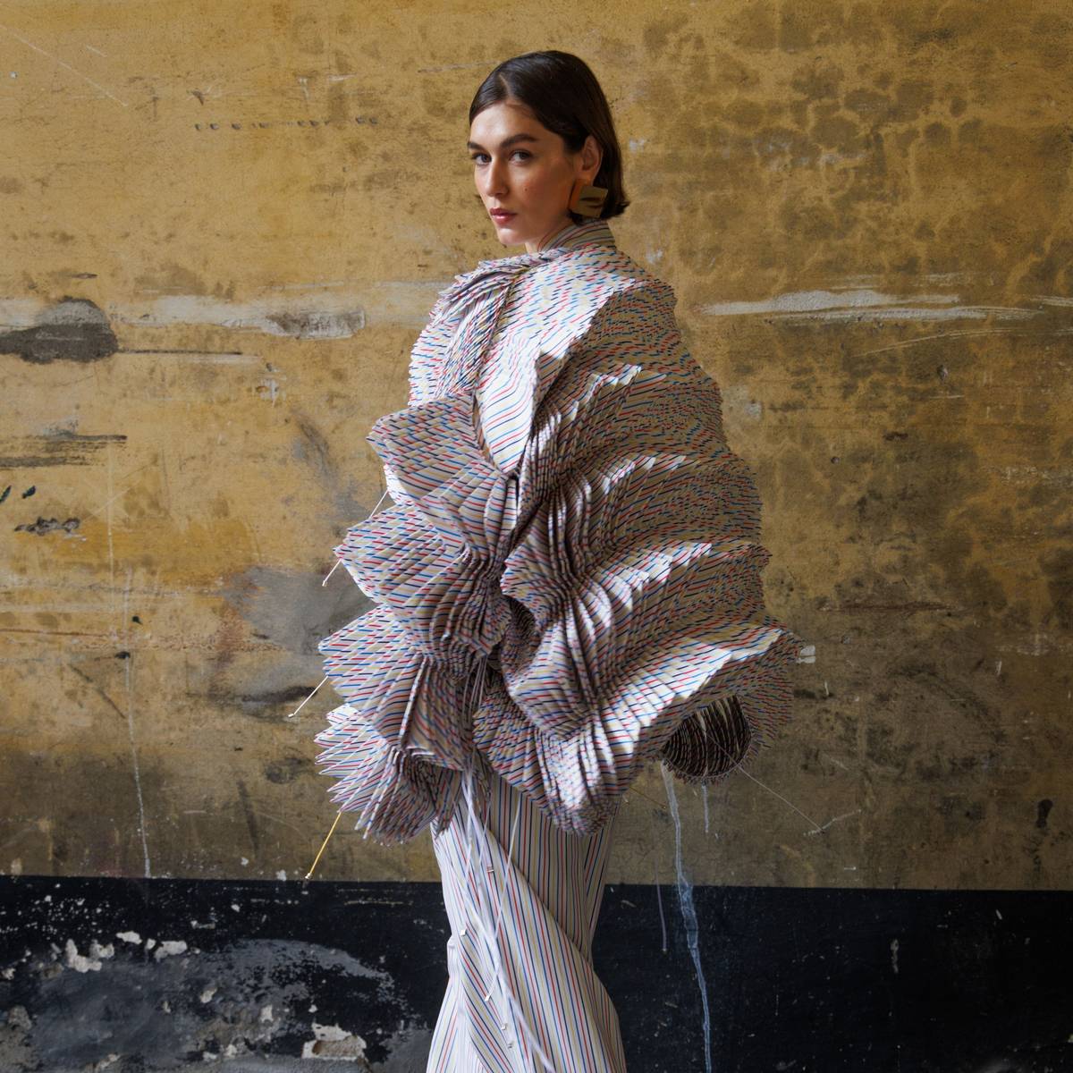 Missoni primavera estate 2025: acconciature geometriche e colori primari dlvr.it/TDWbMp