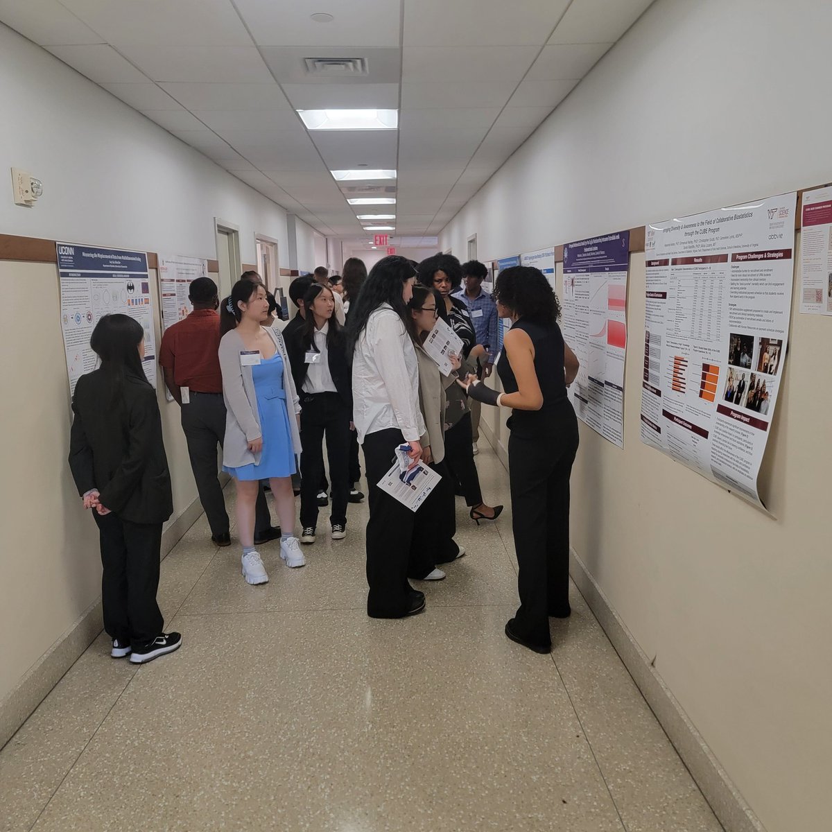 Attendees are currently learning about projects from student researchers during the poster session at #StatFest2024