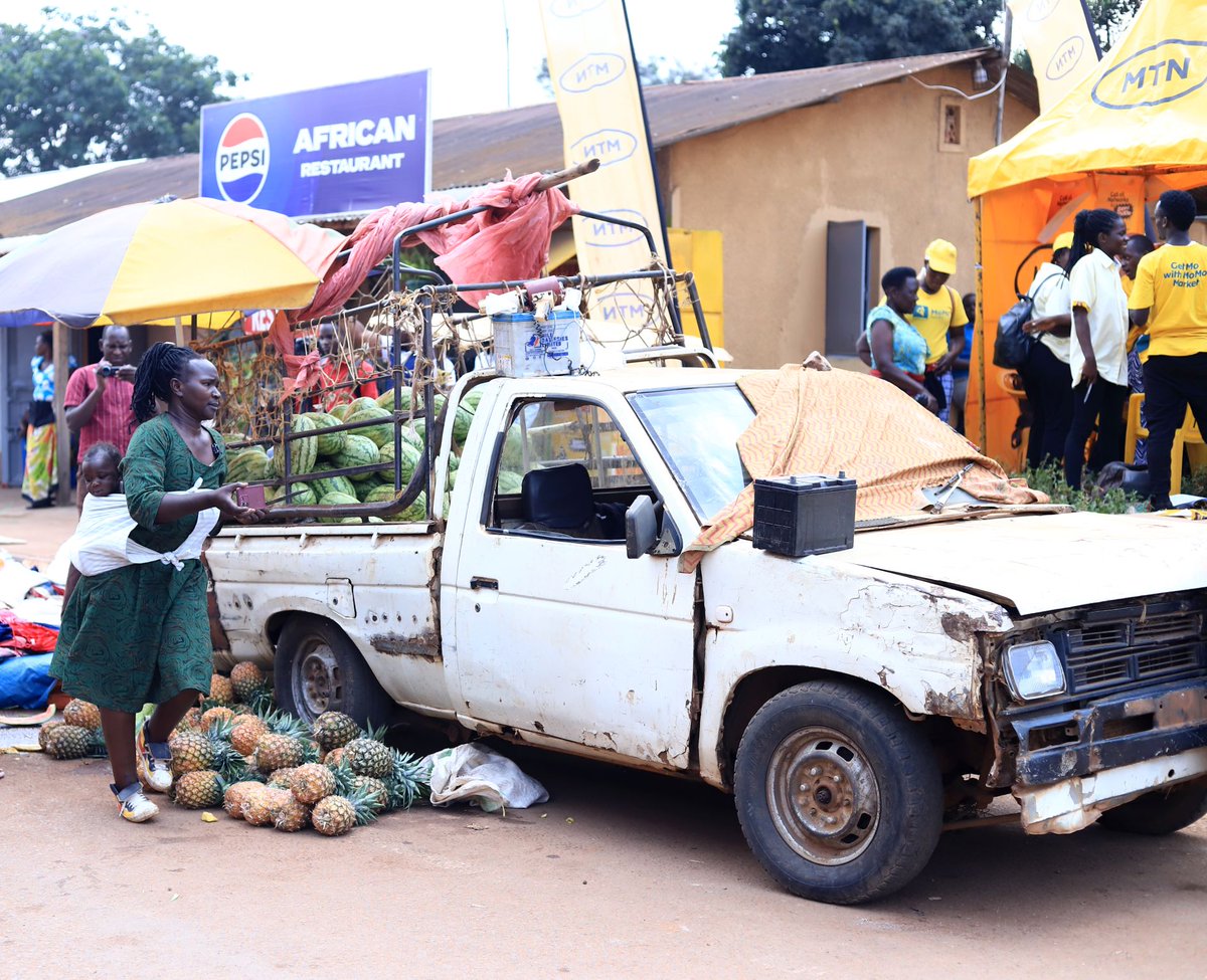 labdunasir's tweet image. Night Ampurire fresh fruit seller in Entebbe reaps from media fundamental role, as @NTVUganda brought to light her plight.@mtnug gifts her with a double cabin where @VivoEnergyUg  rendered fuel offer for one year and @BritamEA offered mechanical insurance for one year.#MakComms