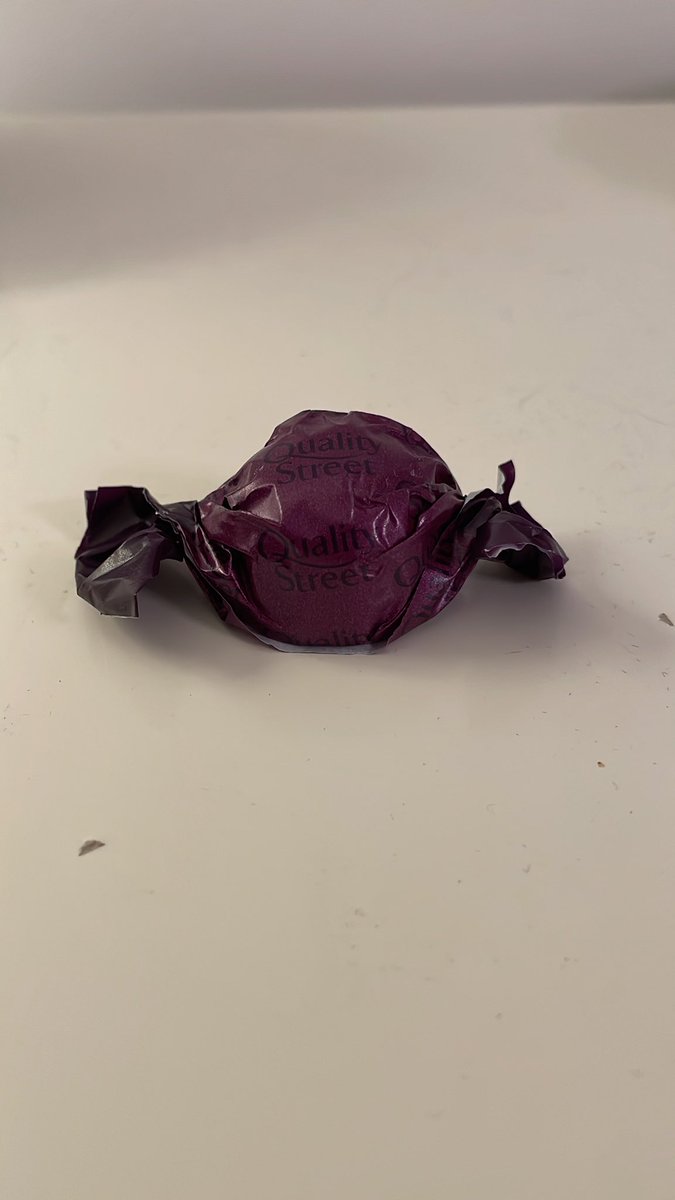 welpmaster's tweet photo. @QualityStreetUK what the hell have you done to the purple one!?! The purple one is not this shape. First you muck around with the wrappers now you muck around with the shape what’s next? nut free purple one for next year. https://t.co/3gvDMYX6nr