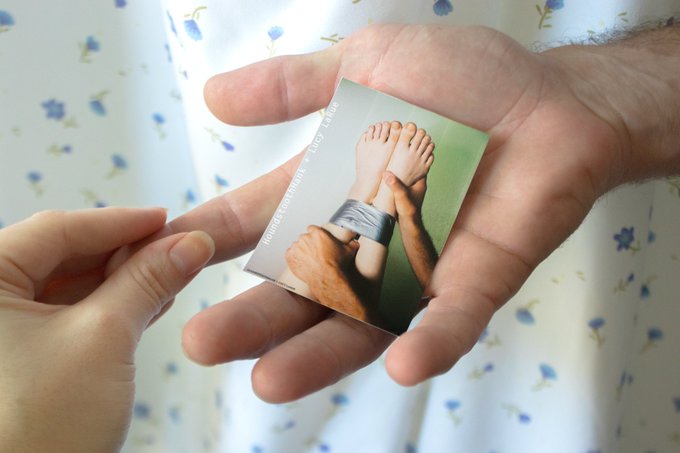 This is a picture of my hand holding Hank's hand holding a picture of his hands holding my feet and I<a href="/tag/mvsales"class="tags"><span>#mvsales</span></a>