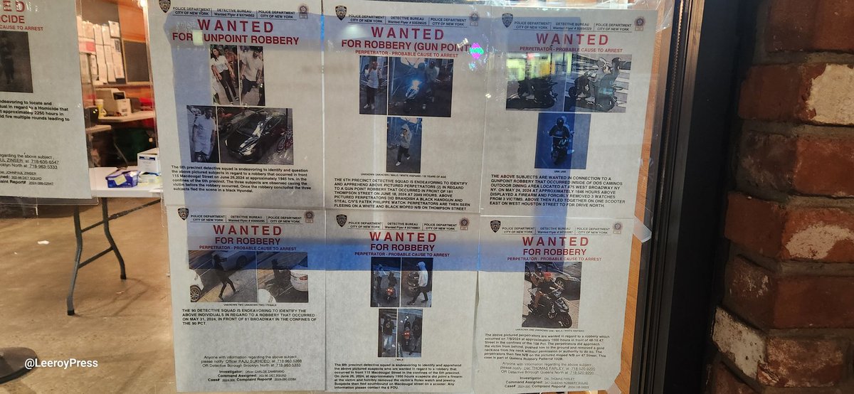 A migrant shelter in Bushwick Brooklyn posts pictures of wanted migrants on their window.