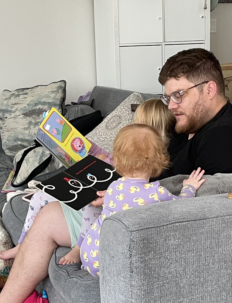 High level of dad mode on display here: reading two books simultaneously to two toddlers