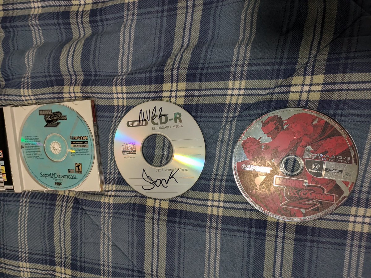 MoonJellyKevin's tweet image. I mean, your Marvel vs. Capcom 2 Dreamcast collection isn&apos;t complete if you don&apos;t have:

(A) The US. version
(B) The Japanese version.
(C) Some dudes mod with references to The Last Dragon, Friday and Frank Sinatra.

#MarvelVsCapcom2