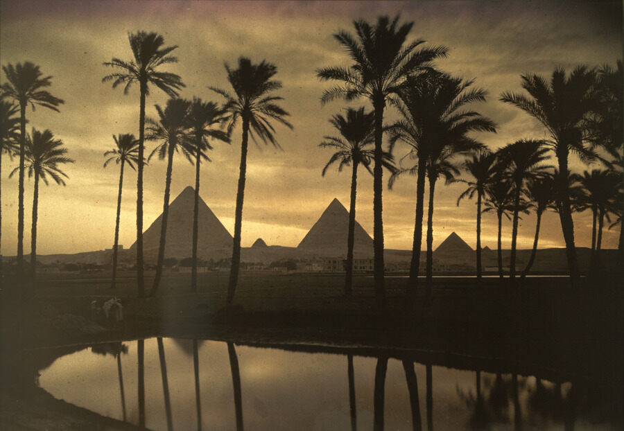 archaeologyart's tweet image. The three Pyramids of Giza are reflected in a pool of water, September 1926. Photograph by Jules Gervais Courtellemont, National Geographic.