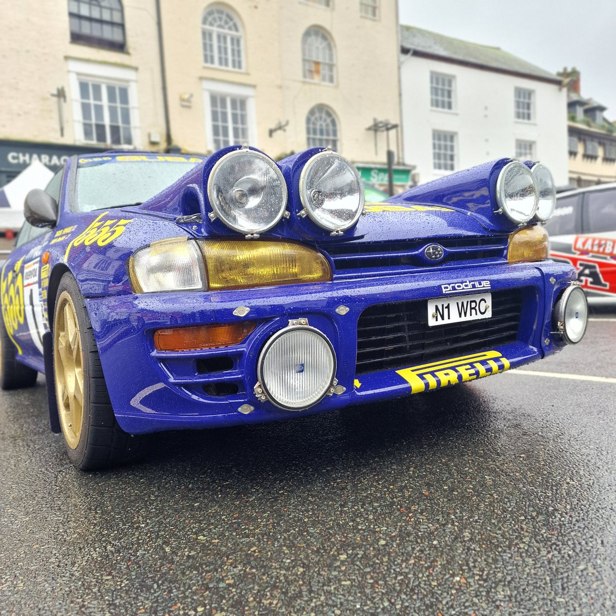 emmajg's tweet image. Lovely yet soggy @prodrive #prodriveday #prodrive  
Lots of rally cars, so many lights.
Also @JensonButton 2004 F1 car
Popped and saw Ian @Popbangcolour too
#paintwithcars

More photos in thread