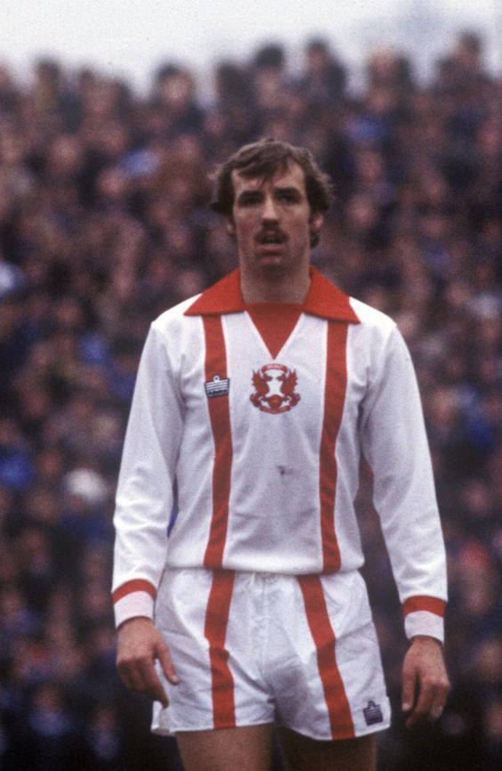 JOE MAYO
In March 1977, he joined <a href="/leytonorientfc/">Leyton Orient FC</a>  along with Allan Glover in a transfer deal with <a href="/WBA/">West Bromwich Albion</a> that saw Laurie Cunningham move in the opposite direction. A year later, he was part of the Orient side that reached the semi-final of the FA Cup before losing to Arsenal.He