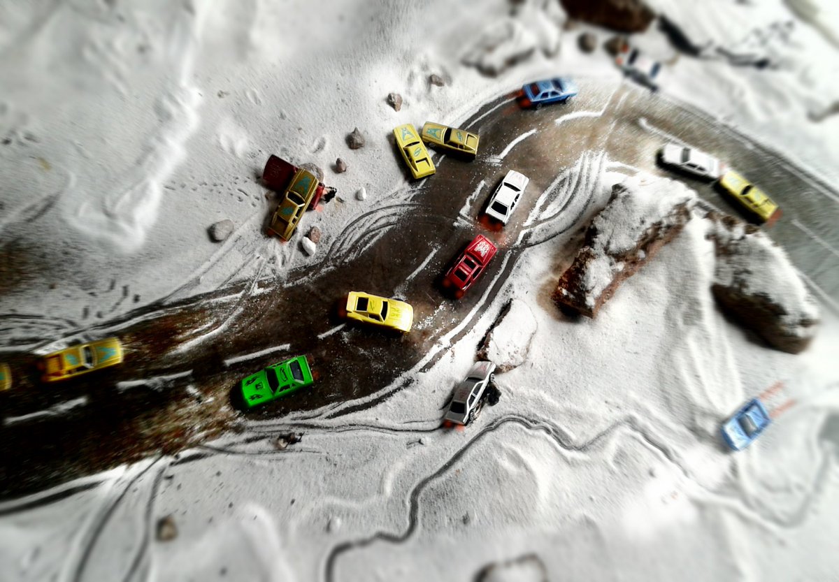 Percy_Maimela_'s tweet image. I create a snow scene using salt, rocks and toy cars.