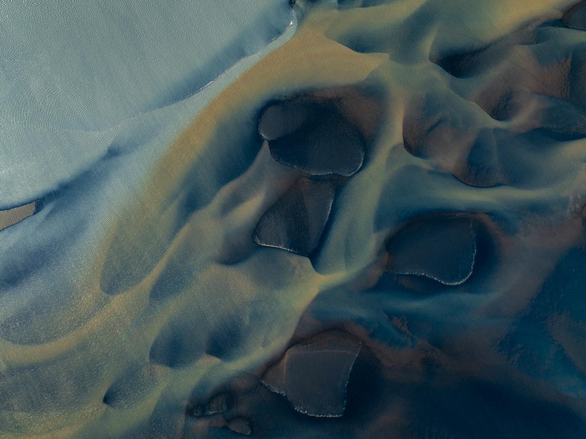 wallpaperable's tweet photo. Dive into the surreal beauty of Iceland's South Coast! 🌊 These glacial rivers paint a mesmerizing picture. Click the link to discover more! 🌍 #TravelGoals #IcelandAdventure https://t.co/ZDZdseYM1i