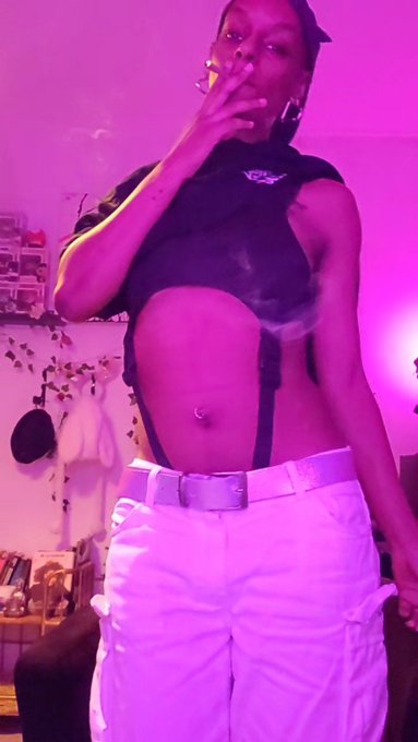 Serving some serious alt fashion vibes while lighting up 💨 Watch me rock this look and relax in style<a href="/tag/altfashion"class="tags"><span>#altfashion</span></a><a href="/tag/chillmode"class="tags"><span>#chillmode</span></a><a href="/tag/smokevibes"class="tags"><span>#smokevibes</span></a>