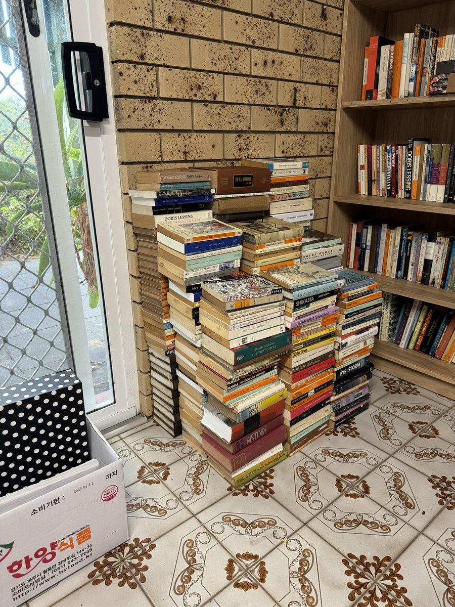 This is a pile of books, all by Nobel winners, that I have yet to read.