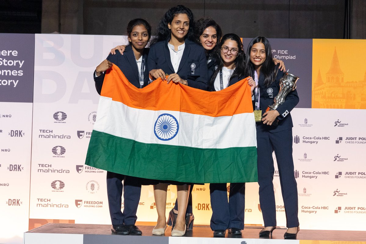 ChessbaseIndia's tweet photo. India convincingly clinches 45th Chess Olympiad Women 2024

Despite losing to Poland in Round 8 by a minimum margin 2.5-1.5 and a draw against the USA in Round 9, Indian Women made a strong comeback by clinching the Gold and no tie-breaks were needed.
 
Top 3
🥇India 🇮🇳 19/22
🥈Kazakhstan 🇰🇿 18/22
🥉United States of America 🇺🇸 17/22

📷FIDE/Michal Walusza, Mark Livshitz and Maria Emelianova