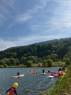 TrinityCroydon's tweet photo. Another exciting day at the Boetius Centre in Wales last week! Students took on a range of activities on the lake, including kayaking, stand-up paddleboarding, raft building, and canoeing. Despite the windy conditions, everyone had a fantastic time. #TrinityTrips #BoetiusCentre https://t.co/RdI3Z2l5dx