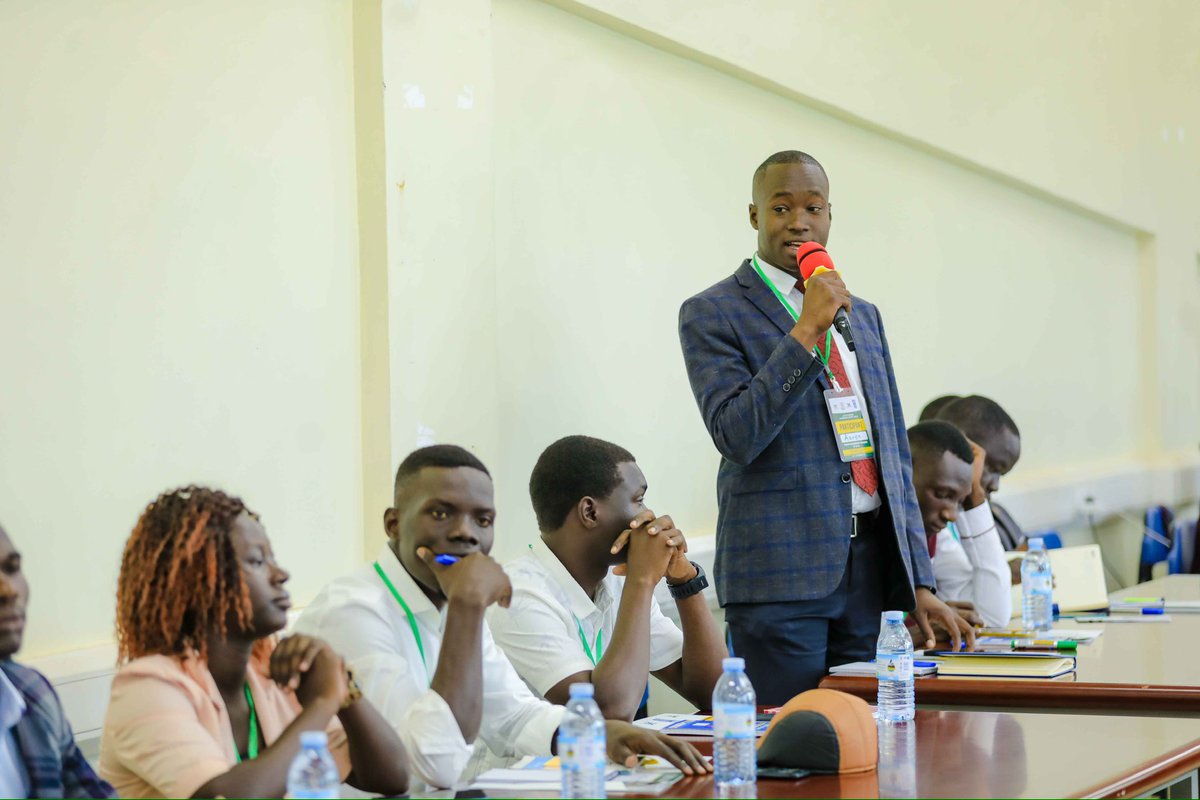 TheJNLC's tweet photo. Mr. Oketayot Aaron, the Gulu University Guild President, is sharing his opening remarks at the YOUNG WOMEN AND YOUTH LEADERSHIP TRAINING, #HappeningNow at the #GuluUniversity Library. Theme: Leadership Training for Transformative and Inclusive Development. #JNLCTraining2024 https://t.co/Rrlor2MrfB