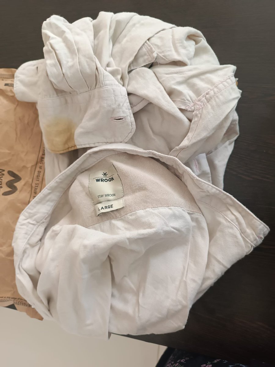 GDS_1985's tweet photo. Myntra delivered a wrong used stained  item against my order.After repeated 
requests of exchange/return now have stopped replying.Not accepting that they delivered a wrong product. Wrote to customer care repeatedly no reply. 
Order was fab india female kurta set.
Myntra Shame. https://t.co/cPJROLO9OB