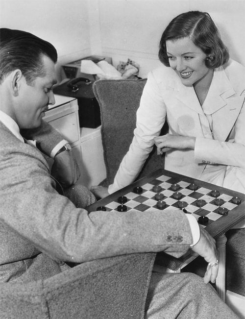 CitizenScreen's tweet photo. For #CheckersDay it’s Clark Gable and Myrna Loy playing checkers on set of TOO HOT TO HANDLE (1938) https://t.co/XN75UeKrj3