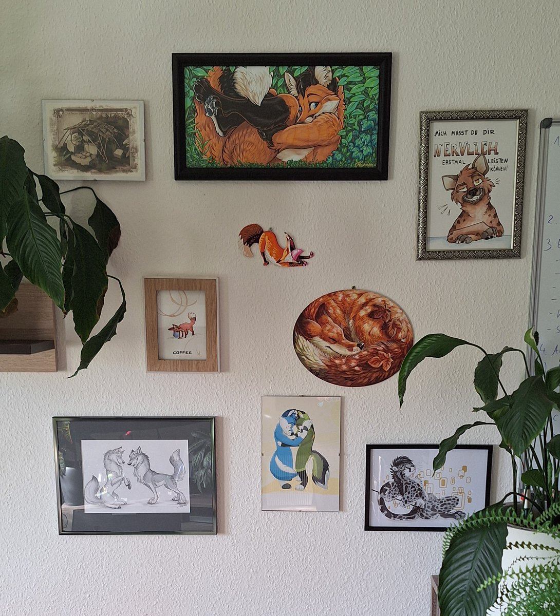 My art wall at home with pieces (except for two) I got at the art show at EF 26, 27 and 28. Featuring art by <a href="/Kashmere_Art/">Kashmere</a> <a href="/Panthera_Arven/">Panthera Arven 🔜🇩🇪 EUROFURENCE Dealer's Den</a> <a href="/TaniDaReal/">TaniDaReal</a> and <a href="/Revaivwra/">Revaivwra</a> (+1 art I got from <a href="/Bloome_BlueFolf/">Bloome! ⚡️ @NFC @Furciety @DoKomi @EAST @EF</a> <3)

Might hang the hyena one at work, dunno yet^^