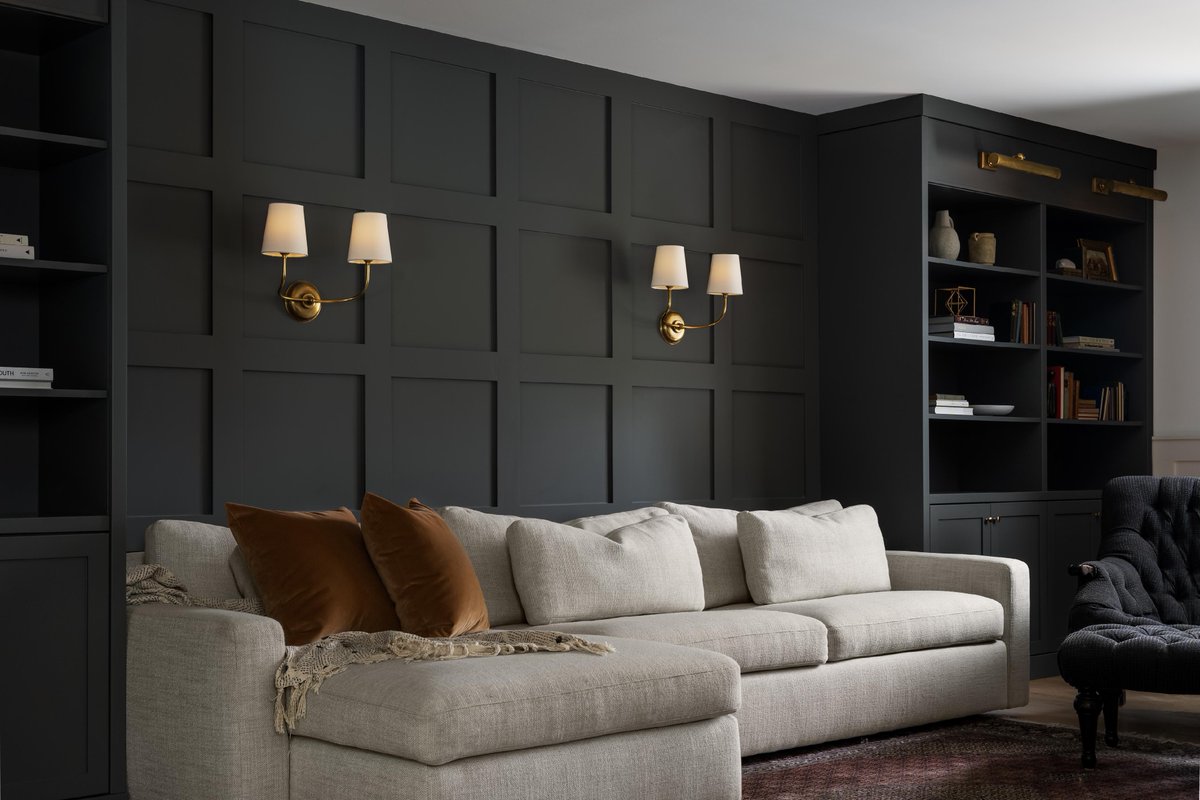 What a difference a bit of millwork, wall paneling, and paint can make to a space! Here’s a before-and-after that truly captures the client’s vision: a warm, inviting space to unwind at the end of the day while seamlessly blending with the open-concept main floor.