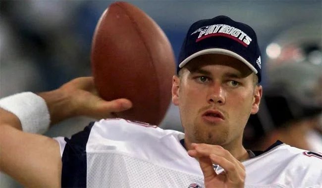 MLFootball's tweet photo. 23-YEARS-AGO TODAY:

A 6th round backup quarterback named Tom Brady replaced the injured Drew Bledsoe for the #Patriots….

@TOMBRADY PROCEEDED TO BECOME A   

-7x Super Bowl Champion 
-5x Super Bowl MVP
-3x #NFL Most Valuable Player
-2x #NFL Offensive Player of the Year
-#NFL Comeback Player of the Year
-3x First-team All-Pro
-3x Second-team All-Pro
-15x Pro Bowler
-5x #NFL  passing touchdowns leader 
-4x #NFL  passing yards leader (2005, 2007, 2017, 2021)
-2x #NFL  passer rating leader (2007, 2010)
-NFL completion percentage leader
-NFL 2000s All-Decade Team
-NFL 2010s All-Decade Team
-NFL 100th Anniversary All-Time Team
-New England #Patriots All-2000s Team
-New England Patriots All-2010s Team
-New England Patriots 50th Anniversary Team
-New England Patriots All-Dynasty Team
-Bert Bell Award (2007)
-AP Male Athlete of the Year (2007)
-2x Sports Illustrated Sportsman of the Year (2005, 2021)
-Most career quarterback wins: 251
-Most career passing attempts: 12,050
-Most career passing completions: 7,753
-Most career passing touchdowns: 649
-Most career passing yards: 89,214
-Most pass completions in a season: 490 (2022)
-Most pass attempts in a season: 733 (2022)
-Longest touchdown pass: 99 yards (tied)
Most games won by a player: 251
Most games played by a non-kicker: 335
-Most games started by a skill position player: 333
Most division titles: 19 (17 with New England, 2 with Tampa Bay)
-Fourth quarterback to beat all 32 teams
Best touchdown to interception ratio in a season: 28:2 (2016)
Oldest quarterback to lead the league in passing yards: 44 (5,316 yards: 2021)
Oldest player to win NFL MVP: 40
Most career passing yards: 89,214
Most career pass completions: 7,753
Most career passing attempts: 12,050
Most career touchdown passes: 649
Most career passing yards with one team: 74,571
Most career pass completions with one team: 6,377
Most career passing attempts with one team: 9,988
Most career passing touchdowns with one team: 541
Most Pro Bowl selections: 15
Most seasons as passing touchdowns leader: 5
Most 4th quarter comebacks: 46
Most game-winning drives: 58
Longest pass-play: 99 yards, tied (2011)
Most consecutive seasons in the NFL playoffs by a team, player or head coach: 14
Most games started: 48
Most games won by a starting quarterback: 35
Most consecutive wins by a starting quarterback: 10 (2001–2005)
Most consecutive wins to start a career by a starting quarterback: 10 (2001, 2003–2005)
Most touchdown passes: 88
Most passing yards: 13,400
Most passing yards in a single playoff game: 505
Most passes completed: 1,200
Most passes attempted: 1,921
Most NFL conference championship appearances by a starting quarterback: 14
Most NFL conference championship wins by a starting quarterback: 10
Oldest quarterback to win an AFC title game: 41 years, 5 months, 17 days
Oldest quarterback to win an NFC title game: 43 years, 5 months, 21 days
Most career 300+ passing yard games: 19
Most game-winning drives: 14
Most fourth-quarter comebacks: 9
Most multi-TD pass games: 29
Super Bowl records: 
Most NFL championships by player: 7
The only starting quarterback to win the Super Bowl for both the AFC and NFC
Most Super Bowl MVPs: 5
One of only two starting quarterbacks to win a Super Bowl for two separate teams 
Most touchdown passes: 21
Most passing yards: 3,039
Most passes completed: 277
Most passes attempted: 421
Most passes completed in a single Super Bowl: 43
Most passes attempted in a single Super Bowl: 62
Most passing yards in a single Super Bowl: 505
Most Super Bowl appearances: 10
Most passing attempts without an interception in a single Super Bowl: 48 
Oldest QB to start a Super Bowl: 43 years, 6 months, and 4 days
Oldest QB to win a Super Bowl: 43 years, 6 months, and 4 days
Oldest player to win Super Bowl MVP: 43 years, 6 months, and 4 days
Most consecutive completions in a single Super Bowl: 16
Most game-winning drives: 6
