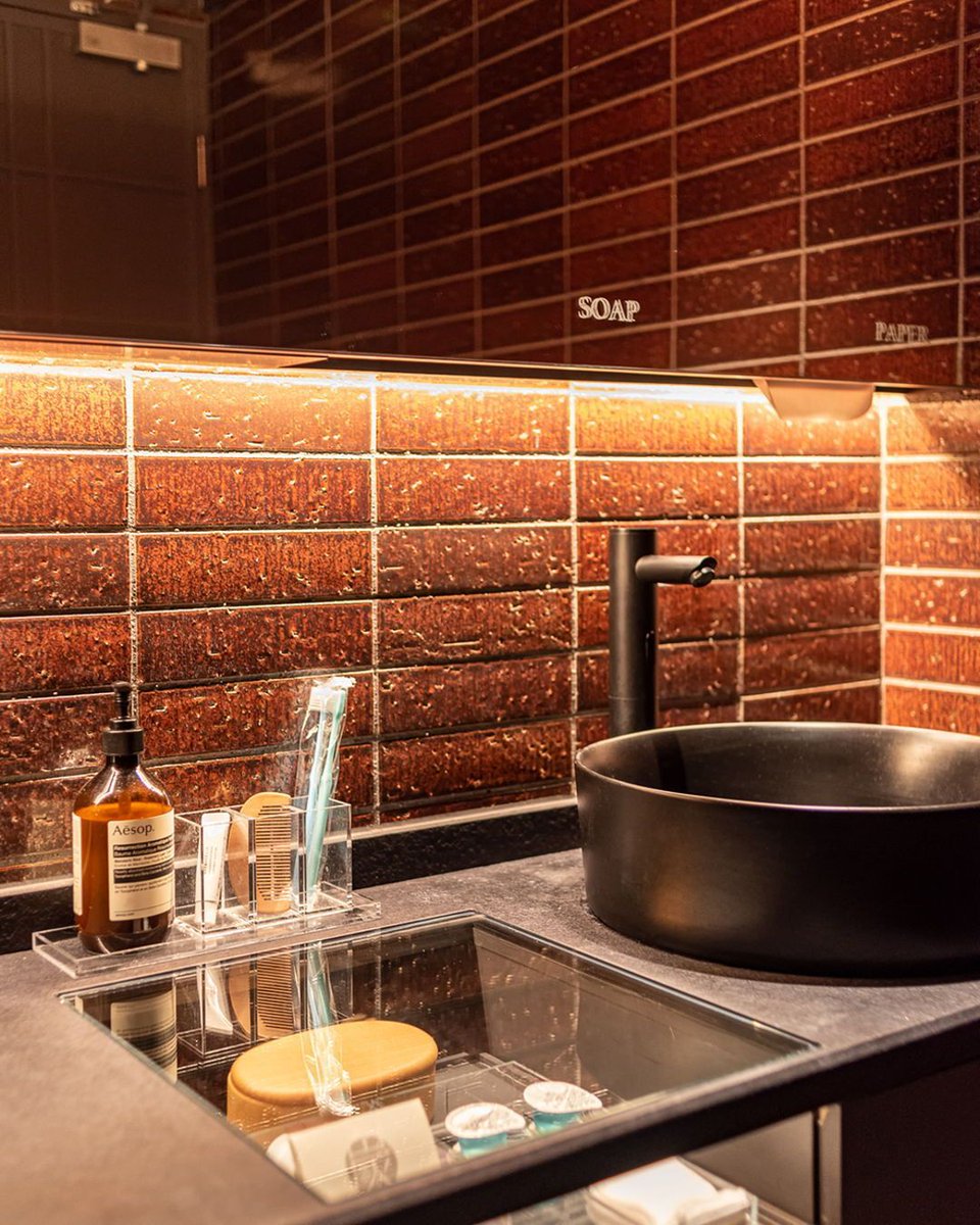 Embrace tranquility in this elegant bathroom, where these autumn red tiles from the Miyabi series from Zen+Clay create a warm and inviting atmosphere. The perfect space for reflection and relaxation.

Order a free Miyabi Sample Card: buff.ly/47qWA0F