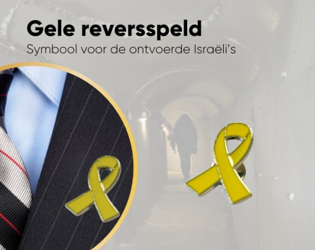 ecomvo's tweet photo. De gele speld voor de Israëlische gegijzelden. #Israel #BarLaat #YellowPin https://t.co/OZx0ZjBM6z