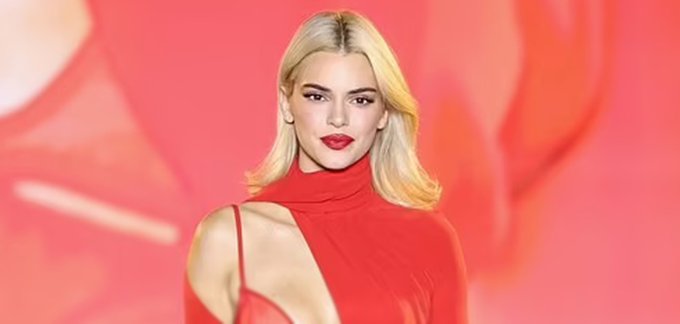 Kendall Jenner Stuns in a Bold Red Cut-Out Dress, Showcasing Her Bra at L'Oréal's Paris Fashion Week Show
