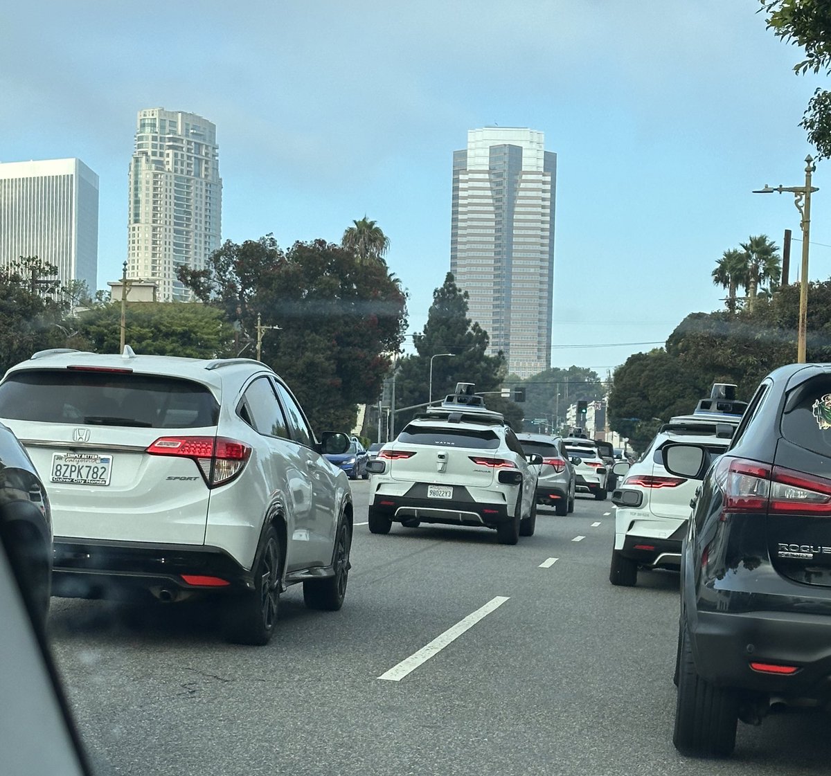 A Waymo trio in LA.  And, for you old timers, yes that's Nakatomi Plaza in the background. #waymo #diehard #LosAngeles