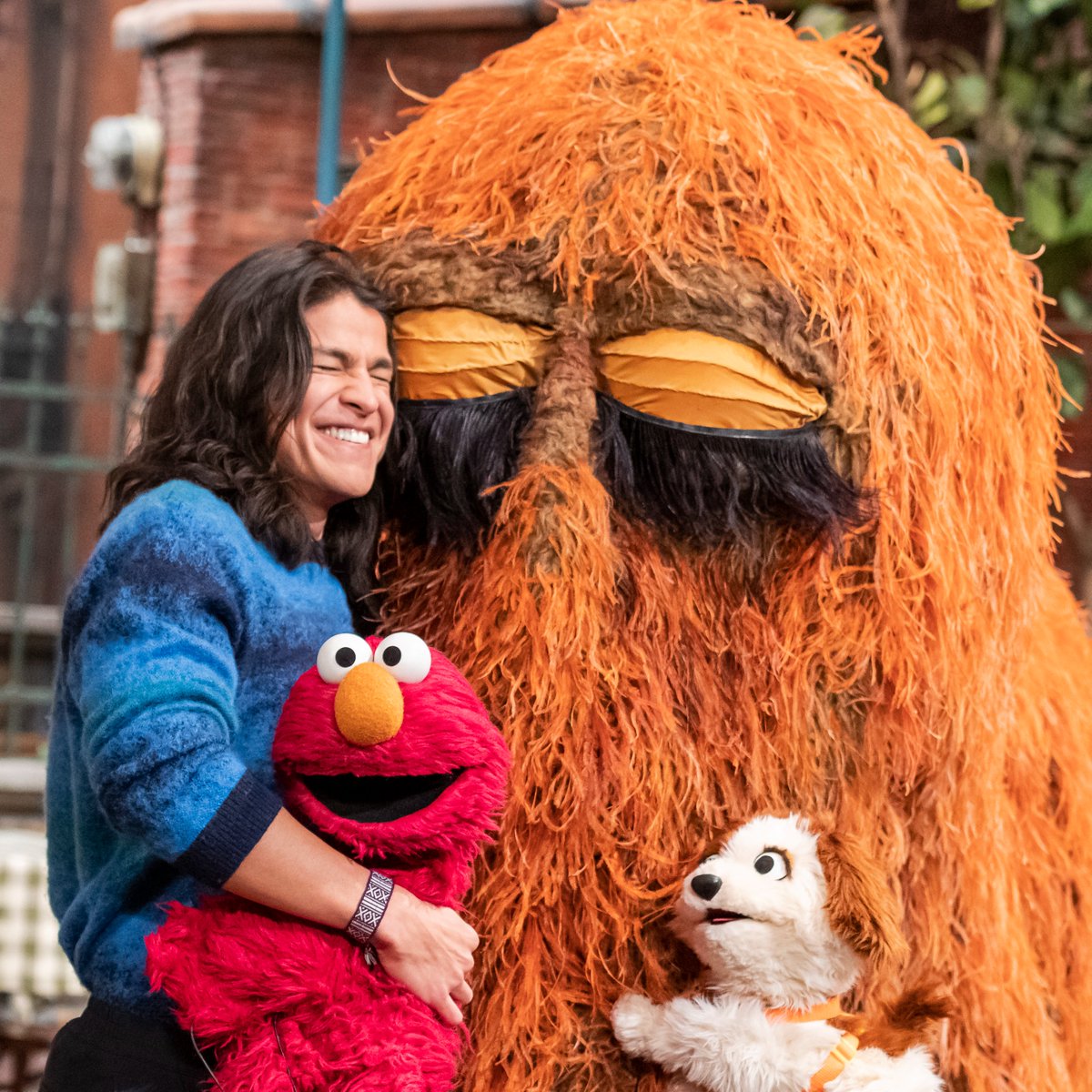 It's a group-hug kind of day. Elmo loves you! ❤️#FurryFriendsForever