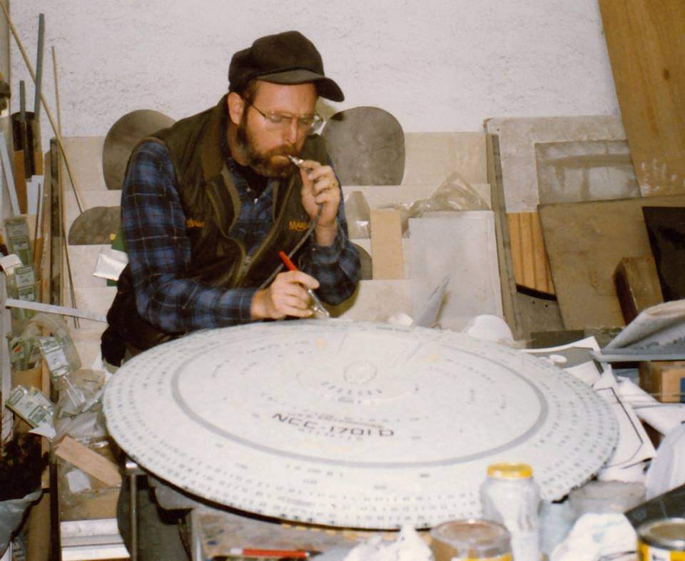 No compressor? No problem! Bruce MacRae giving the saucer of the 4' Enterprise D model a good bl.........blast with the airbrush (get your mind out of the gutter!)