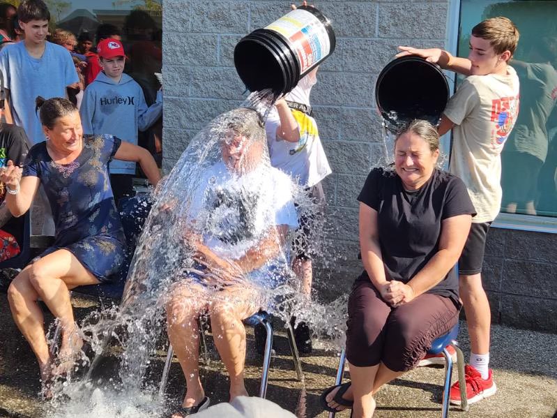 Thanks to the incredible support of our community, we've reached our goal of raising $3,000 for Terry Fox. Throughout the week, our dedicated staff took on various challenges as we hit fundraising milestones. Here's our team members participating in the ice bucket challenge.